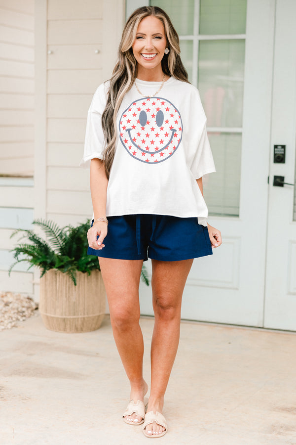 Chic Soul plus size clothing, White short sleeve tee with a smiley face graphic on the center of the shirt that is filled with red stars

