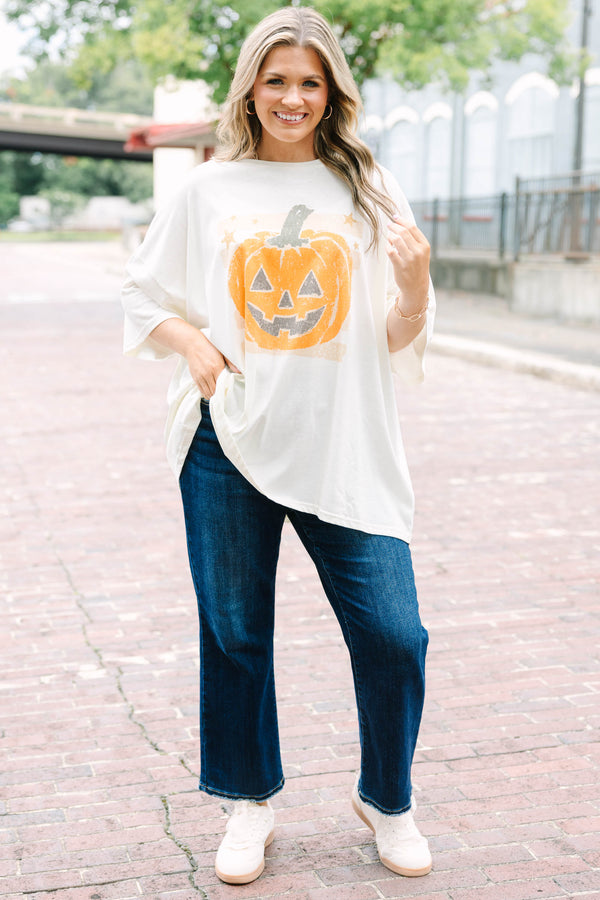 Ivory oversized boyfriend tee with a happy pumpkin graphic 