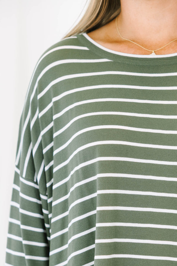 Chic Soul plus size clothing, olive green long sleeve top with white thin horizontal stripes and ruffle hem