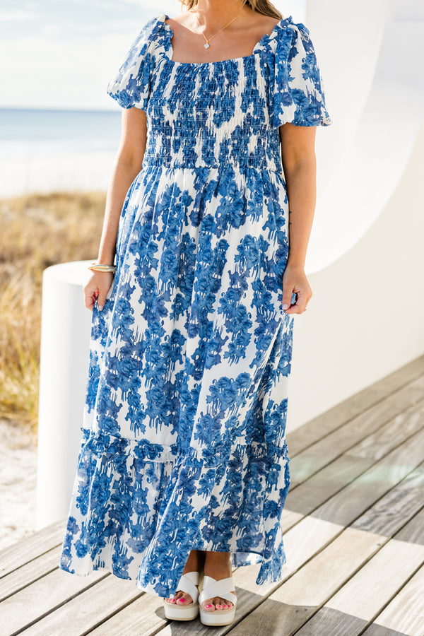 Chic Soul plus size clothing, short-puffed-sleeve blue maxi dress with ruffled detailing and a smocked bodice with a blue and white floral pattern
