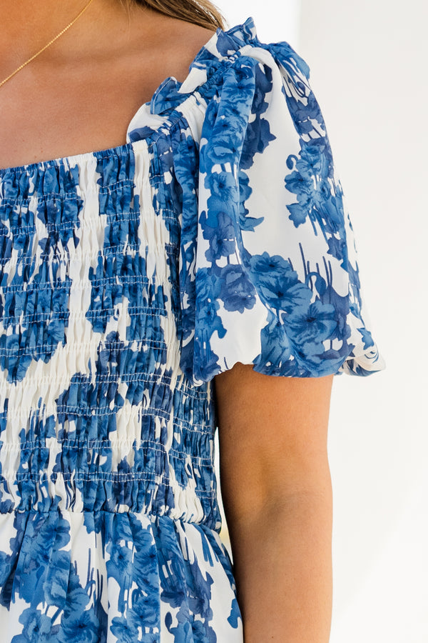 Chic Soul plus size clothing, short-puffed-sleeve blue maxi dress with ruffled detailing and a smocked bodice with a blue and white floral pattern