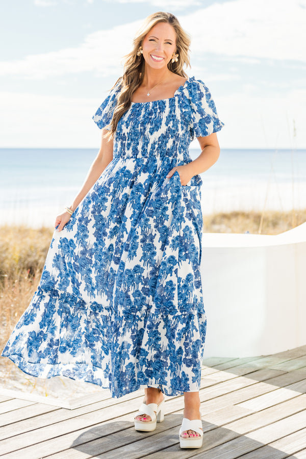 Chic Soul plus size clothing, short-puffed-sleeve blue maxi dress with ruffled detailing and a smocked bodice with a blue and white floral pattern