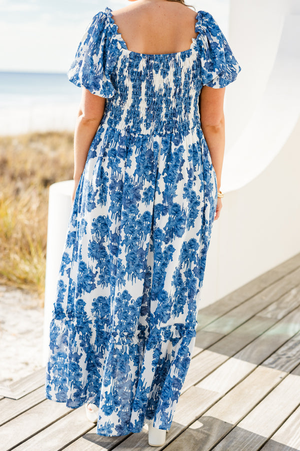 Chic Soul plus size clothing, short-puffed-sleeve blue maxi dress with ruffled detailing and a smocked bodice with a blue and white floral pattern