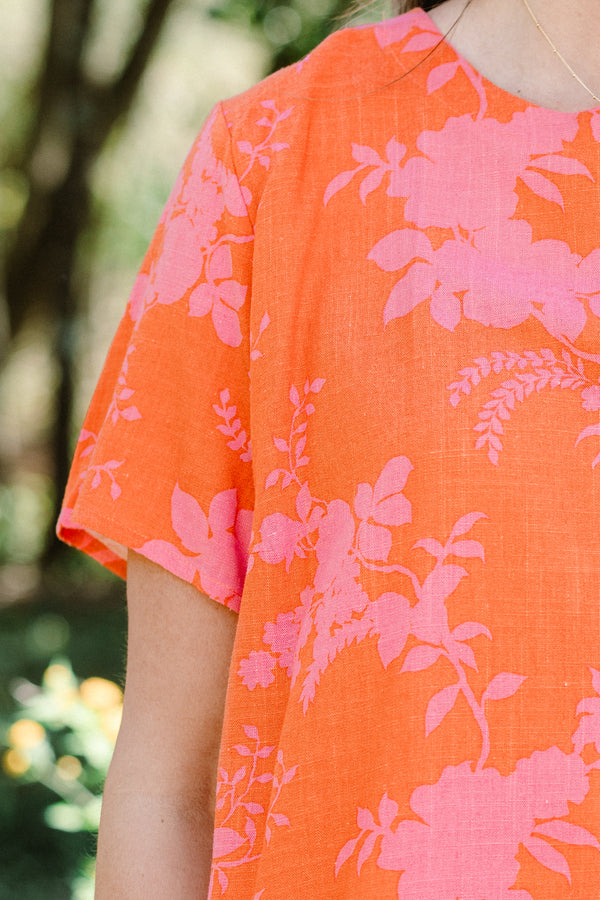 Chic Soul plus size clothing, short-sleeve orange-red top with a high-scoop-neckline with a pink floral pattern