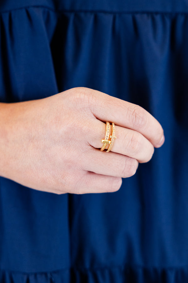 Chic Soul plus size clothing, gold double-band ring with an open design and one band is sleek while the other is covered in small gemstones and a cross connecting the two bands at the center 