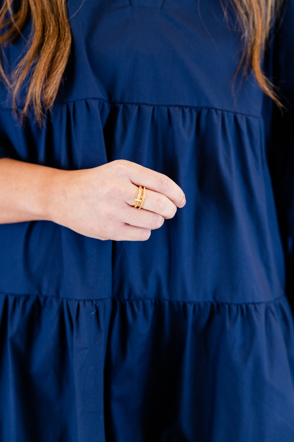 Chic Soul plus size clothing, gold double-band ring with an open design and one band is sleek while the other is covered in small gemstones and a cross connecting the two bands at the center 
