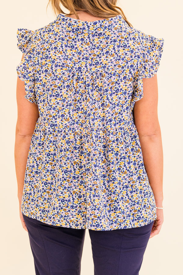 Chic Soul plus size clothing, short-sleeve blue combo top with ruffled sleeves and v-neckline with small blue and yellow floral spotted pattern