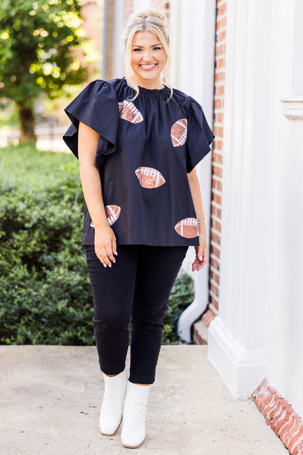  Chic Soul plus size clothing, short-flutter-sleeve black top with smocked neckline and brown sequin football patches scattered across top 