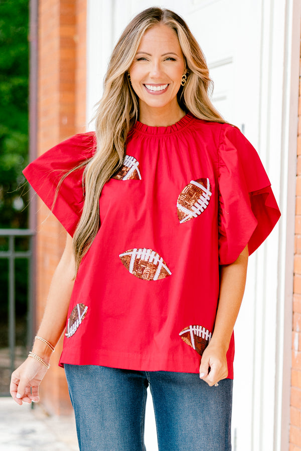 Chic Soul plus size clothing, red top with flutter sleeves and brown sparkly football patches throughout the shirt 