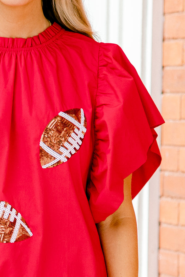 Chic Soul plus size clothing, red top with flutter sleeves and brown sparkly football patches throughout the shirt 
