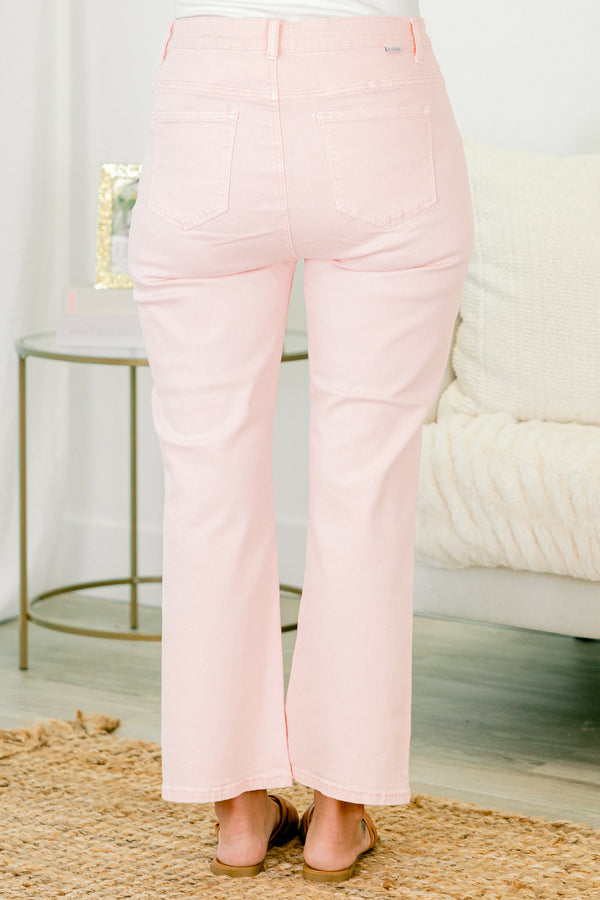 Chic Soul plus size clothing, soft pink jeans that have a slight flare at the end of the pant legs as well as front and back pockets 
