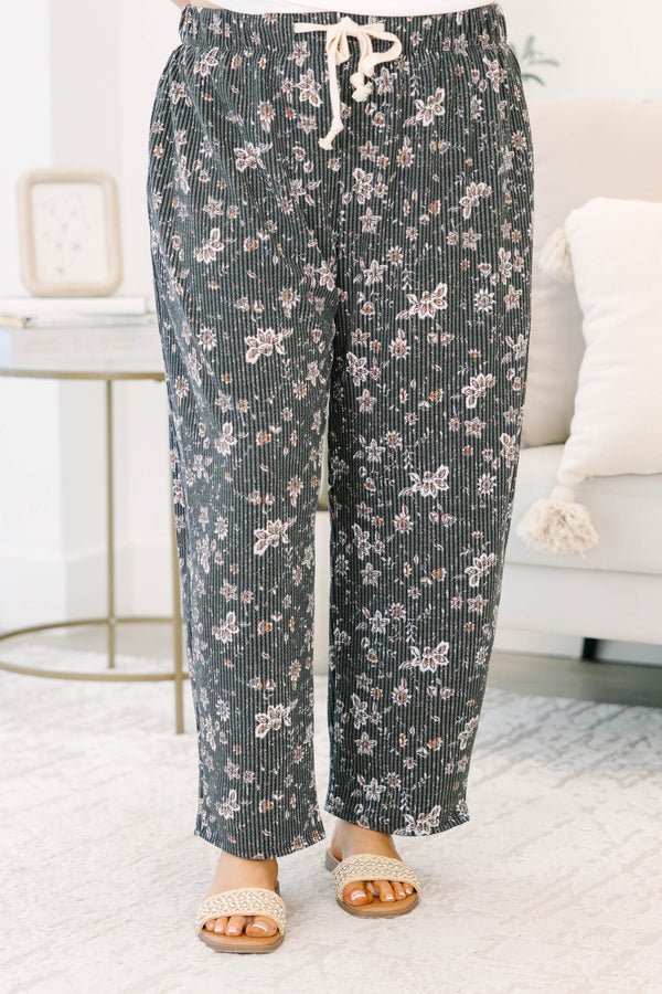 Plus Size black floral corduroy pants with a wide leg fit and drawstring waist.