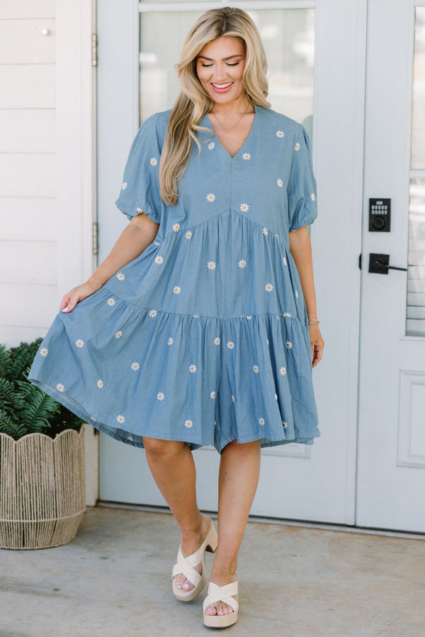 Chic Soul plus size clothing, short-puffed-sleeve denim blue ruffled baby doll top with a v-neckline and a subtle white daisy pattern 