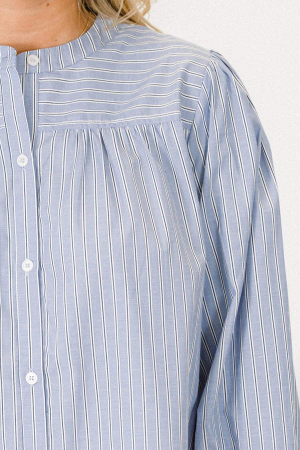 Chic Soul plus size clothing, long sleeve blue pin stripe button up top with cuffed sleeves with ruffle detail