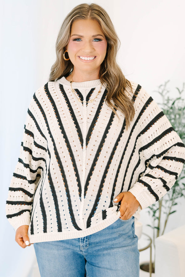 Plus Size cream and black chevron striped pointelle knit sweater with long sleeves and crew neck.