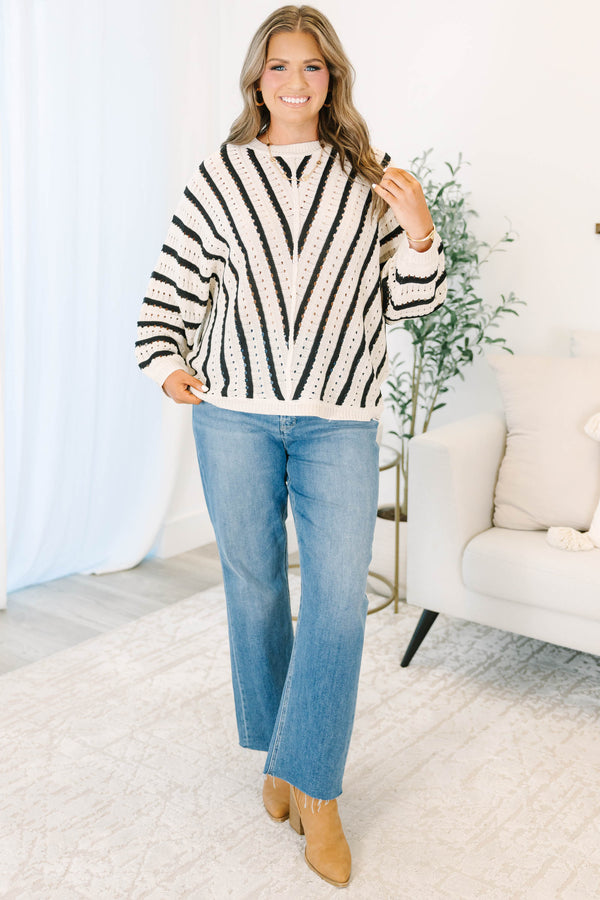 Plus Size cream and black chevron striped pointelle knit sweater with long sleeves and crew neck.