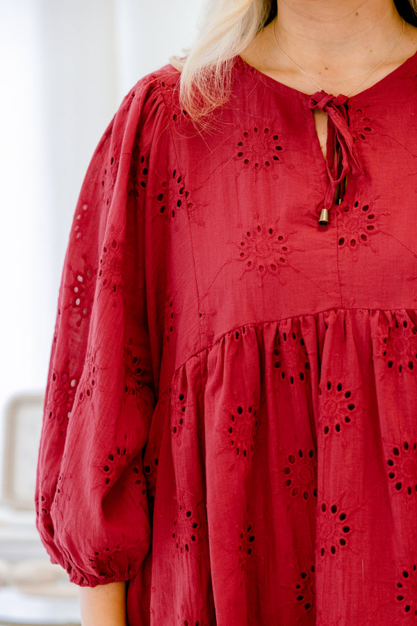 Chic Soul plus size clothing, burgundy red long sleeve baby doll short dress with eyelet circular pattern and tie at the neckline