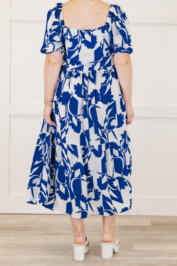 Chic Soul plus size clothing, short-puffed-sleeve ruffled royal blue midi dress with a smocked bodice and a square-neckline with an abstract floral blue and white pattern 