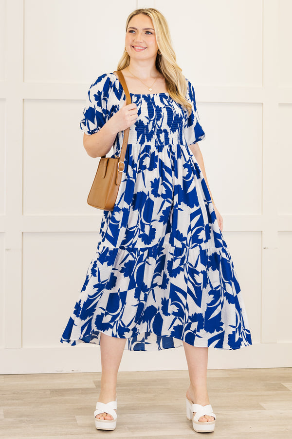 Chic Soul plus size clothing, short-puffed-sleeve ruffled royal blue midi dress with a smocked bodice and a square-neckline with an abstract floral blue and white pattern 