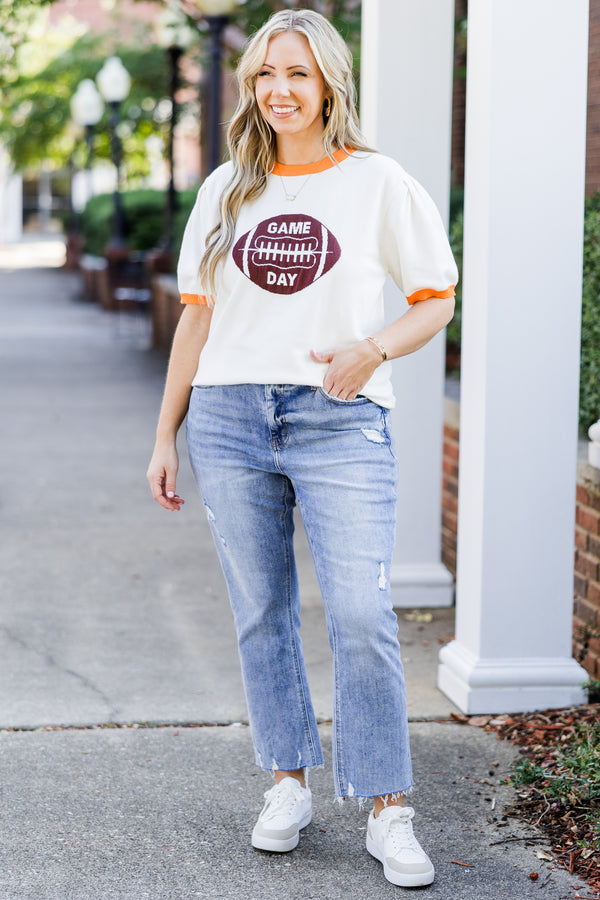 Chic Soul plus size clothing, white short sleeve knit top with orange trim along round neckline and puff sleeves with brown football graphic with 