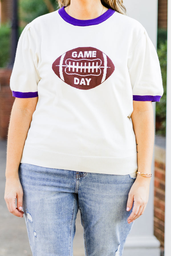 Chic Soul plus size clothing, white short sleeve knit top with purple trim along round neckline and puff sleeves with brown football graphic with 