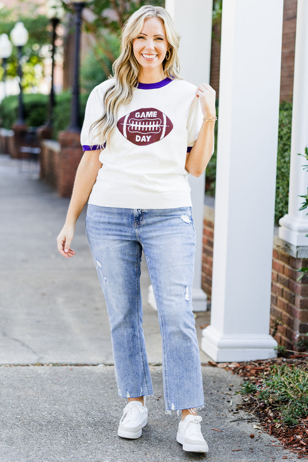 Chic Soul plus size clothing, white short sleeve knit top with purple trim along round neckline and puff sleeves with brown football graphic with 