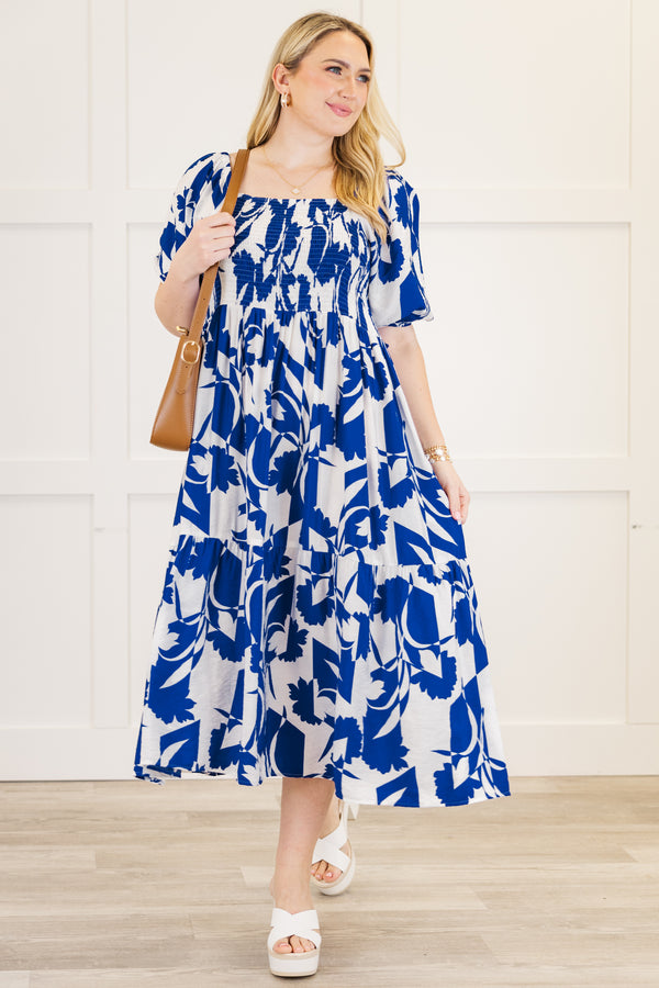 Chic Soul plus size clothing, short-puffed-sleeve ruffled royal blue midi dress with a smocked bodice and a square-neckline with an abstract floral blue and white pattern 
