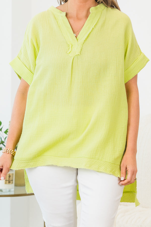 Chic Soul plus size clothing, short-cuffed-sleeve lime green top with a v-neckline and subtle distressed fraying with a high-low hemline