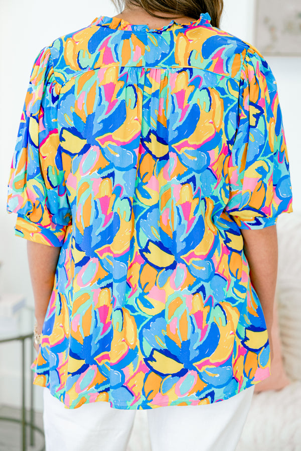 Chic Soul plus size clothing, short sleeve blue babydoll top with yellow and pink abstract pattern