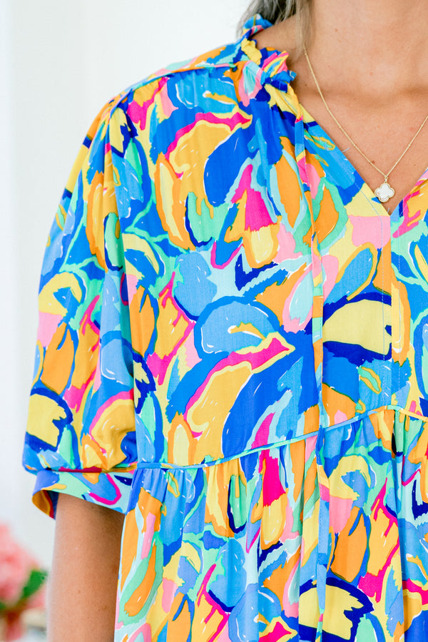 Chic Soul plus size clothing, short sleeve blue babydoll top with yellow and pink abstract pattern
