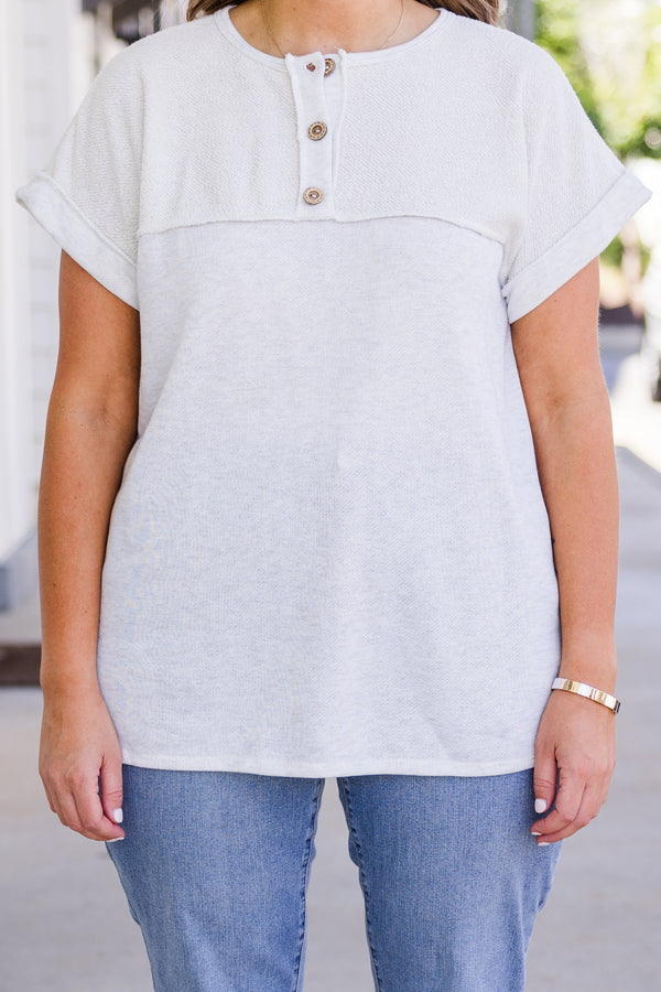Chic Soul plus size clothing, short-sleeve light heather grey top with light brown henley button detailing and scoop-neckline