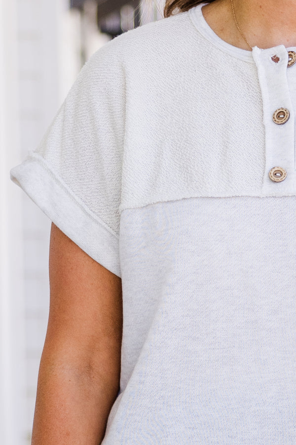 Chic Soul plus size clothing, short-sleeve light heather grey top with light brown henley button detailing and scoop-neckline