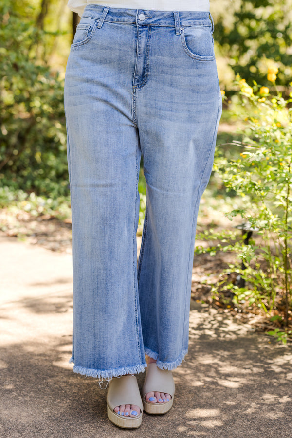 chic soul plus size clothing, Light wash jeans with front pockets and a fringed detail at the end of the pant leg 