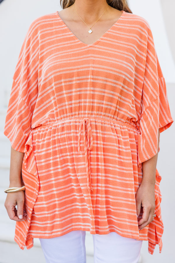 Chic Soul plus size clothing, orange short sleeve poncho top with cinched waist with tie detail with v neckline and flowy sleeves with white striped pattern
