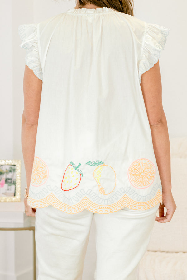 Chic Soul plus size clothing, white top with flutter sleeves and stitching details or fruit and various patterns along the bottom of the top 