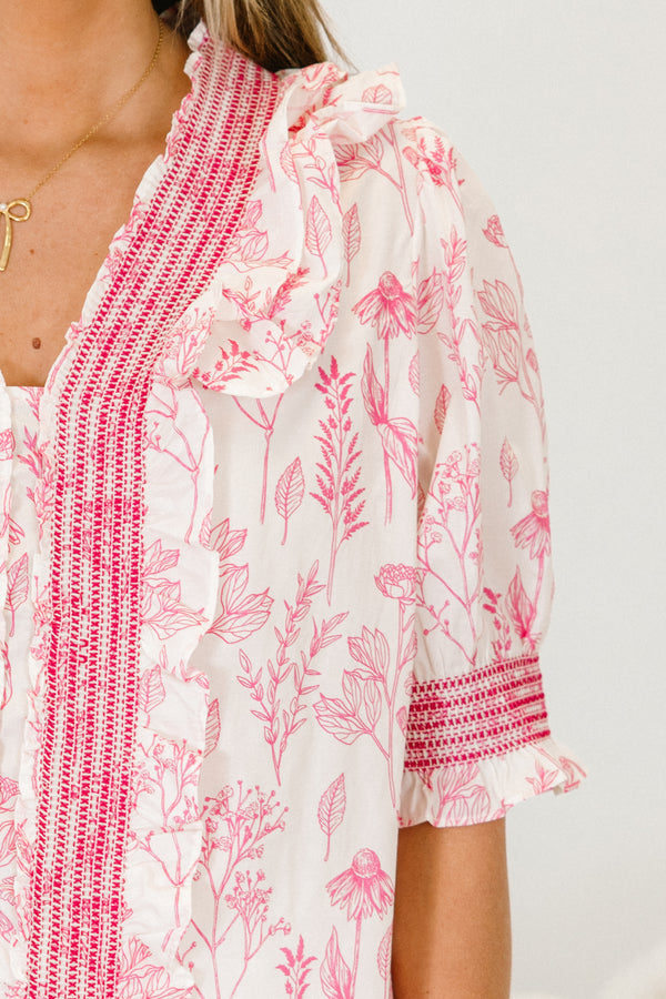 Chic Soul plus size clothing, white short sleeve top with pink floral detail with pink stitching detail along center and sleeves