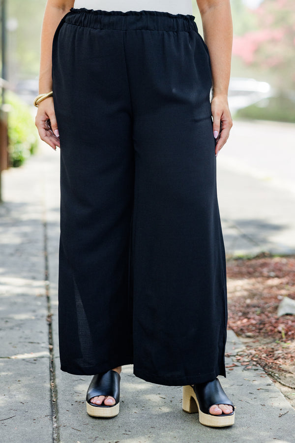 Chic Soul plus size clothing, black flowy pants with ruched stretchy waist and pockets plus small slit along calf