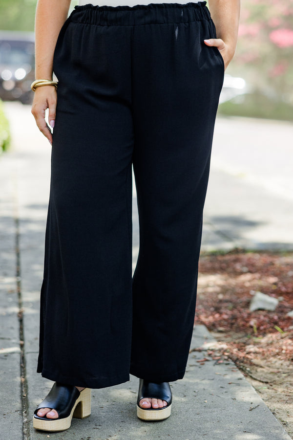 Chic Soul plus size clothing, black flowy pants with ruched stretchy waist and pockets plus small slit along calf
