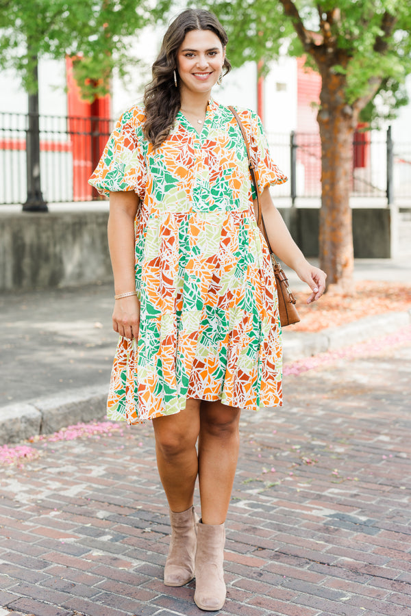 Chic Soul plus size clothing, orange short sleeve multi abstract print mini dress with tiered detail and v cutout along neckline with puff sleeves