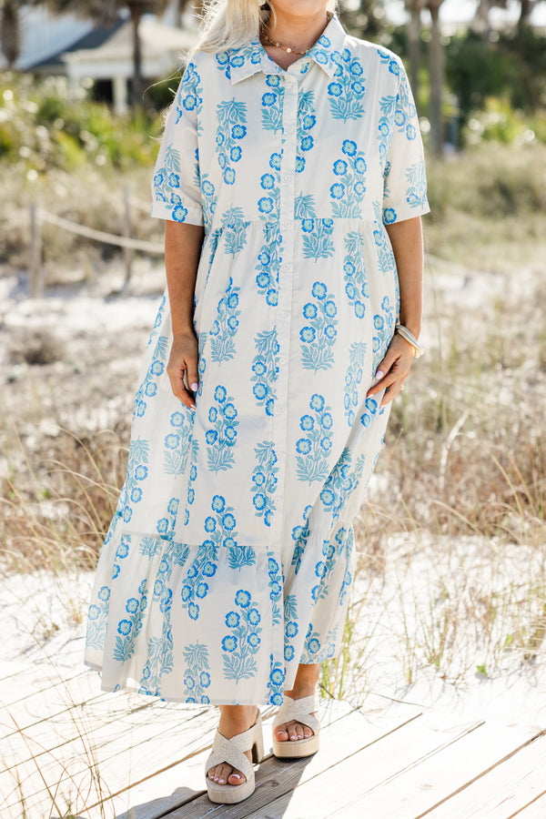 Chic Soul plus size clothing, short-sleeve collared buttoned off white ruffled baby doll maxi dress with a sky blue floral abstract pattern