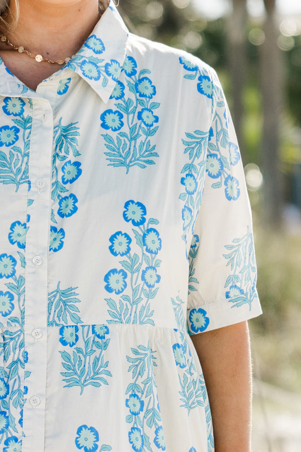 Chic Soul plus size clothing, short-sleeve collared buttoned off white ruffled baby doll maxi dress with a sky blue floral abstract pattern