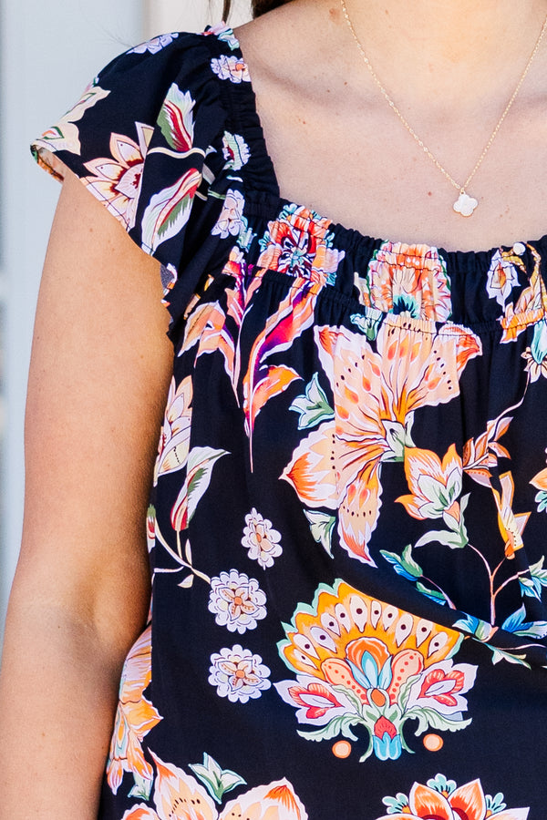 Chic Soul plus size clothing, black short sleeve top with orange and blue floral pattern and square neckline
