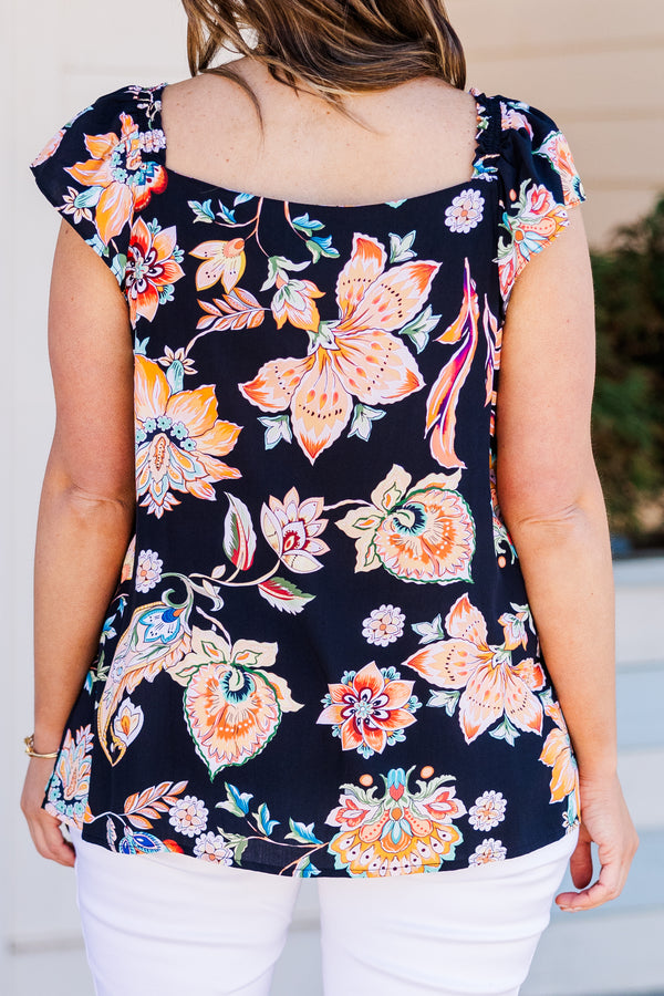 Chic Soul plus size clothing, black short sleeve top with orange and blue floral pattern and square neckline