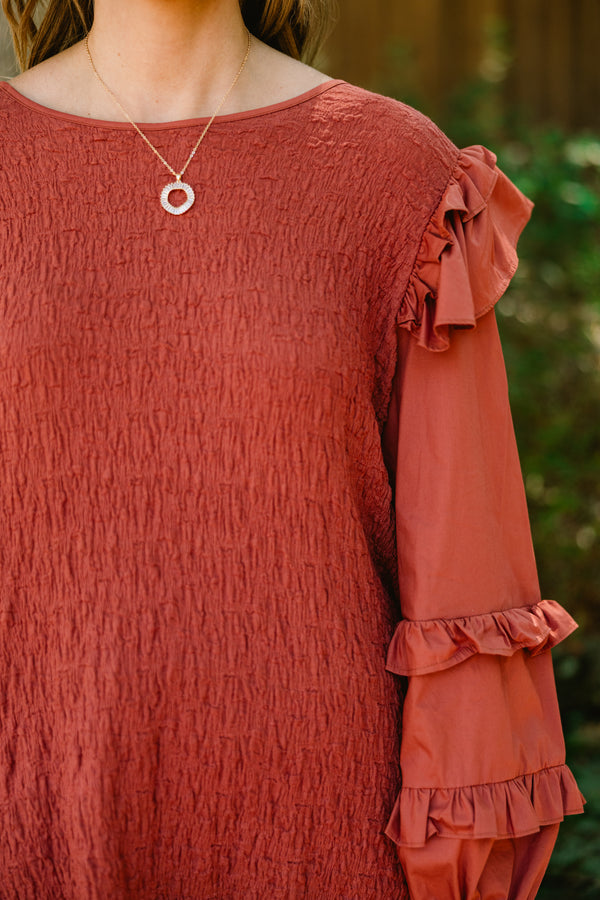 Chic Soul plus size clothing, rust colored long sleeve top with ruffle details on the sleeves and shoulders