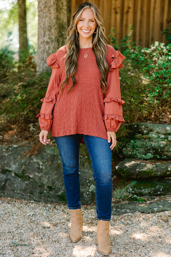 Chic Soul plus size clothing, rust colored long sleeve top with ruffle details on the sleeves and shoulders