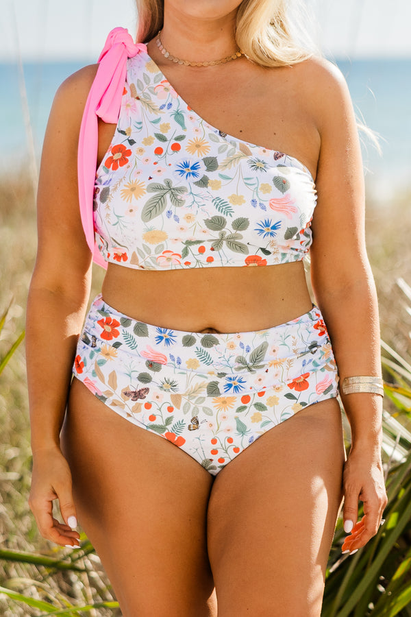 Plus Size high-waisted bikini bottoms with a white and blue floral and butterfly print.