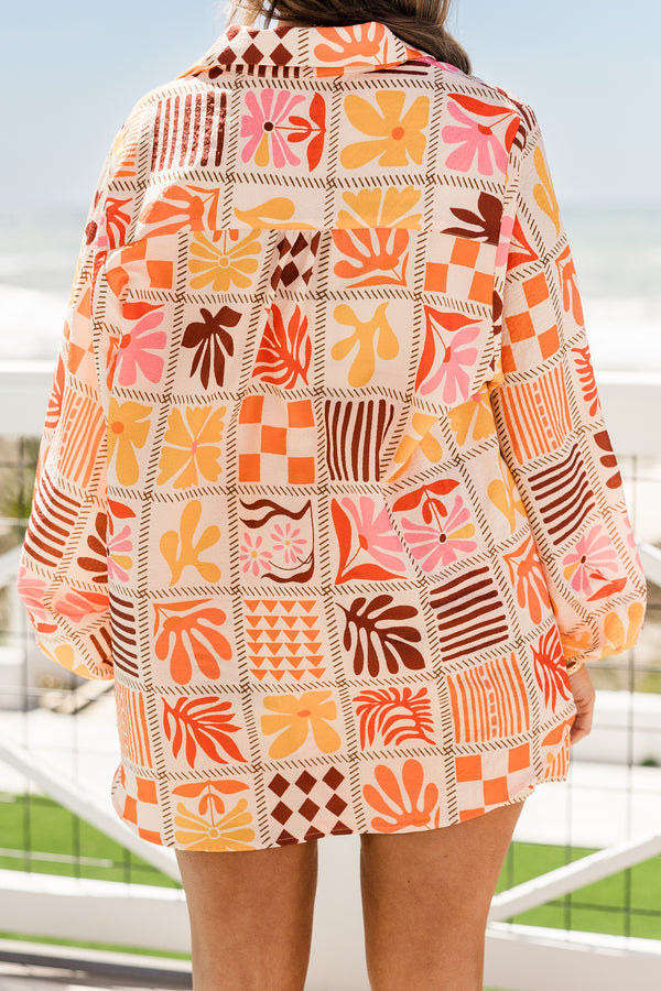 Chic Soul plus size clothing, collared buttoned long-sleeve orange multi-colored flowy top with a geometric floral pattern 