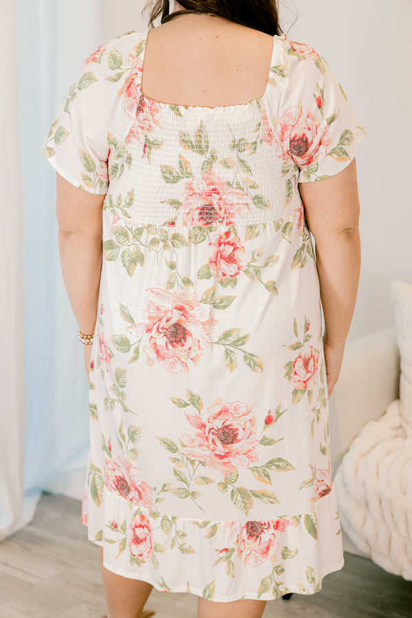 Plus Size ivory floral dress with a smocked bust, square neckline, and short sleeves.