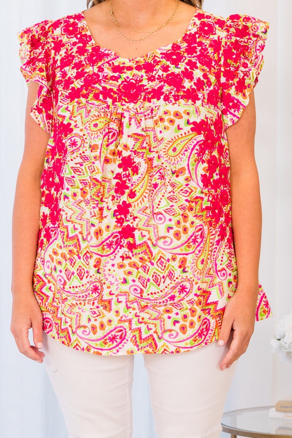 Plus Size ivory multi-patterned top with pink floral embroidery and ruffled cap sleeves.

