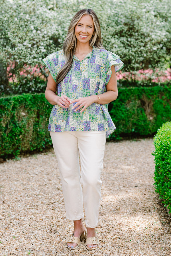 Chic Soul plus size clothing, purple patchwork purple pattern short sleeve top with v neckline with tie detail and ruffle flare sleeves